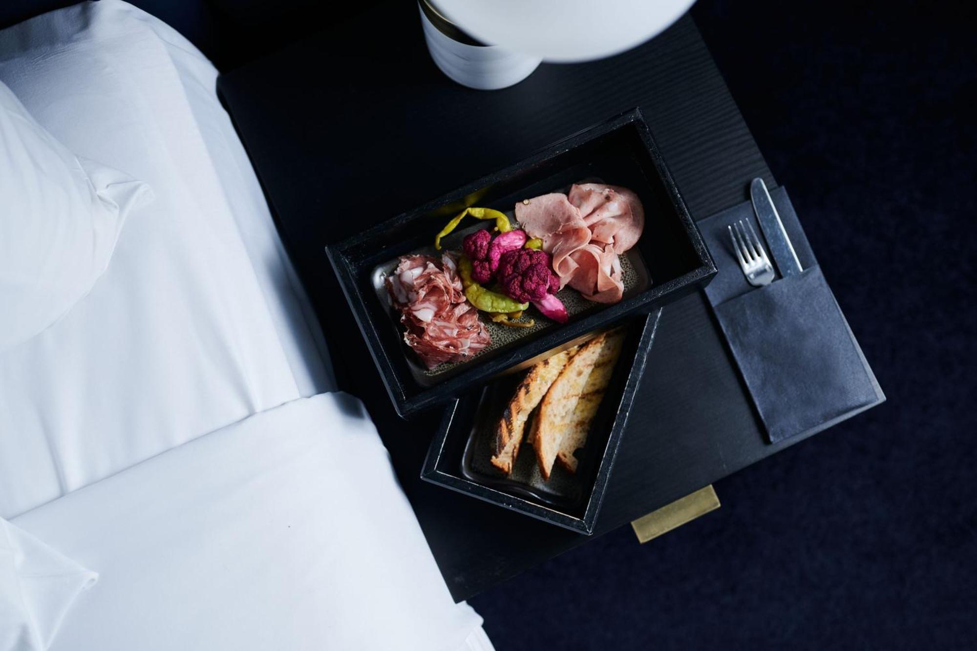 Midnight Hotel, Autograph Collection Kanberra Dış mekan fotoğraf A first-class meal on board a Lufthansa plane